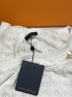 LOUIS VUITTON Personal Collection/24ss Early Autumn New Collection Sexy Slanted Shoulder Hollow Badge Letter Logo Metal Chain  A slim dress with a wrapped buttocks for women. - Image 23