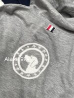 THOM BROWNE 24 Early Autumn New CollectionSuper Comfortable  Lightweight hooded design long sleeved blouse for women. Three color options with classic four bar dog pattern - Image 6