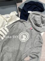 THOM BROWNE 24 Early Autumn New CollectionSuper Comfortable  Lightweight hooded design long sleeved blouse for women. Three color options with classic four bar dog pattern - Image 7