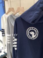 THOM BROWNE 24 Early Autumn New CollectionSuper Comfortable  Lightweight hooded design long sleeved blouse for women. Three color options with classic four bar dog pattern - Image 31