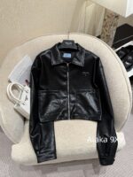 Prada 24 AutumnWinter New Collection  Environmentally friendly protein leather fabric triangle logo nylon lapel jacket top, short skirt set, feminine slimming - Image 3