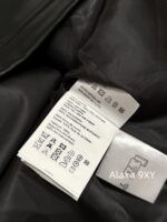 Prada 24 AutumnWinter New Collection  Environmentally friendly protein leather fabric triangle logo nylon lapel jacket top, short skirt set, feminine slimming - Image 5