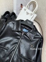Prada 24 AutumnWinter New Collection  Environmentally friendly protein leather fabric triangle logo nylon lapel jacket top, short skirt set, feminine slimming - Image 7