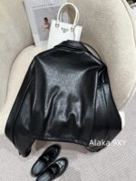 Prada 24 AutumnWinter New Collection  Environmentally friendly protein leather fabric triangle logo nylon lapel jacket top, short skirt set, feminine slimming - Image 11