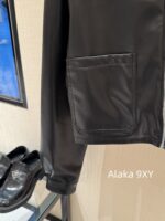 Prada 24 AutumnWinter New Collection  Environmentally friendly protein leather fabric triangle logo nylon lapel jacket top, short skirt set, feminine slimming - Image 22