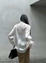 Yves Saint Laurent is super comfortable with a drape and skin friendly acetate fabric Y  2024 Autumn/Winter New Couplet Vneck Acetate Shirt for Women. Available in black and white - Image 15