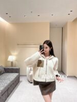 Loewe Autumn/Winter New Collection   Leather patchwork pocket design, zipper style fur integrated cape, lamb fur jacket for women  warm and textured - Image 8