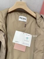 miumiu   2024 autumn and winter new collectionClassic letter logo hooded casual mid length down jacket loose fit for both men and women. 90 National Standard Goose Down