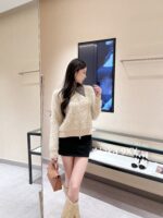 chanel   2024 Autumn/Winter New CollectionWhite Rich Beauty Dress Up Leather Zipper Collar Long Hair Hoodie Leather Sweater Metal Logo Brooch for Women - Image 7