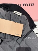 MIUMIU autumn and winter versatile matching2024SS new college style gray elastic letter logo pleated skirt for women/short skirt for women - Image 5