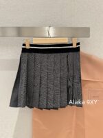 MIUMIU autumn and winter versatile matching2024SS new college style gray elastic letter logo pleated skirt for women/short skirt for women - Image 11