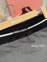 MIUMIU autumn and winter versatile matching2024SS new college style gray elastic letter logo pleated skirt for women/short skirt for women - Image 14