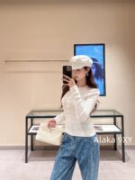 Chanel High Version 4b Early Autumn New Collection   Heavy industry hollowed out jacquard knitted round neck gemstone buckle long sleeved knitted base shirt for women. - Image 19