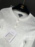Chanel High Version 4b Early Autumn New Collection   Heavy industry hollowed out jacquard knitted round neck gemstone buckle long sleeved knitted base shirt for women. - Image 23