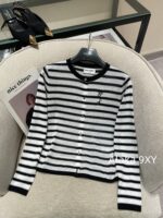 Yves Saint Laurent Early Autumn Collection   Bead round neck letter logo black and white color blocked striped knitted sweater for women - Image 4