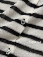 Yves Saint Laurent Early Autumn Collection   Bead round neck letter logo black and white color blocked striped knitted sweater for women - Image 8