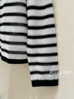 Yves Saint Laurent Early Autumn Collection   Bead round neck letter logo black and white color blocked striped knitted sweater for women - Image 13
