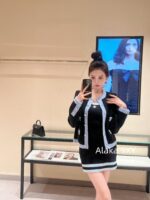 Chanel is a musthave for white, wealthy and beautiful socialites. The classic four pocket logo button knit cardigan jacket for women's cardigans with a long fur round neck is a new style for early autumn. - Image 8