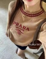 Prada  Early autumn college style outfitMelad color scheme color blocked jacquard letter logo round neck cashmere/wool blend pullover sweater  vest long sleeved vest - Image 33