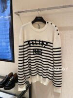 Celine  24 Autumn New Collection  Letter Embroidered Contrast Striped Knitted Sweater Round Neck Shoulder Buckle Hooded Sweater for Women. Loose fit large version