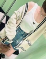 Prada  American college style  street inspired embroidered color blocked logo, large pocket Vneck wool knit cardigan jacket. Loose oversized unisex design - Image 4