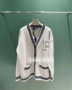 Prada  American college style  street inspired embroidered color blocked logo, large pocket Vneck wool knit cardigan jacket. Loose oversized unisex design - Image 6