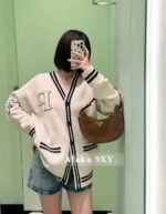 Prada  American college style  street inspired embroidered color blocked logo, large pocket Vneck wool knit cardigan jacket. Loose oversized unisex design - Image 7