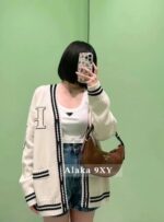 Prada  American college style  street inspired embroidered color blocked logo, large pocket Vneck wool knit cardigan jacket. Loose oversized unisex design - Image 8