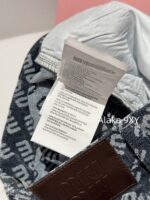 MIUMIU  2024 Autumn/Winter New Collection  Laser Jacquard Letter Logo High Waist slimming straight leg wide leg jeans for women. Show off weight and cover the width of the hips - Image 5