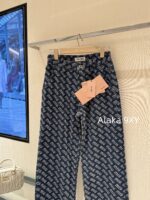MIUMIU  2024 Autumn/Winter New Collection  Laser Jacquard Letter Logo High Waist slimming straight leg wide leg jeans for women. Show off weight and cover the width of the hips - Image 8