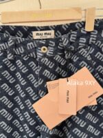 MIUMIU  2024 Autumn/Winter New Collection  Laser Jacquard Letter Logo High Waist slimming straight leg wide leg jeans for women. Show off weight and cover the width of the hips - Image 9