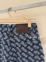 MIUMIU  2024 Autumn/Winter New Collection  Laser Jacquard Letter Logo High Waist slimming straight leg wide leg jeans for women. Show off weight and cover the width of the hips - Image 11