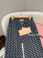 MIUMIU  2024 Autumn/Winter New Collection  Laser Jacquard Letter Logo High Waist slimming straight leg wide leg jeans for women. Show off weight and cover the width of the hips - Image 12
