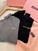 MIUMIU  A musthave high neck base sweater for autumn and winter2024 new letter logo basic versatile and super comfortable/100 sheep wool material high neck sweater - Image 6