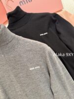 MIUMIU  A musthave high neck base sweater for autumn and winter2024 new letter logo basic versatile and super comfortable/100 sheep wool material high neck sweater - Image 12