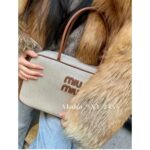 MIUMIU "American Retro Girl Style"  Self retained Zhang Yuanying's 2024 SS fashion collection canvas briefcase  Japanese limited edition canvas denim fabric canvas style - Image 24