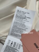 MIUMIU "American College Style Dressing"  Color blocked lapel long sleeved polo collar wine red autumn and winter new style versatile and highend pleated skirt skirt - Image 10