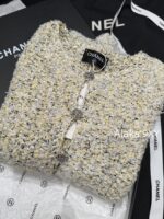 chanel   2024k Early Autumn New Collection  Women's crochet lemon yellow sand thread rhinestone buckle hollow long sleeved knitted cardigan jacket. Mini Short - Image 6