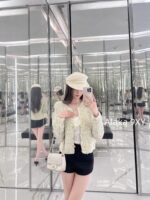 chanel   2024k Early Autumn New Collection  Women's crochet lemon yellow sand thread rhinestone buckle hollow long sleeved knitted cardigan jacket. Mini Short - Image 10