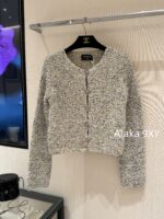 chanel   2024k Early Autumn New Collection  Women's crochet lemon yellow sand thread rhinestone buckle hollow long sleeved knitted cardigan jacket. Mini Short - Image 13