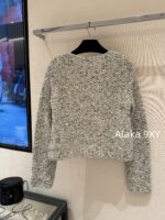 chanel   2024k Early Autumn New Collection  Women's crochet lemon yellow sand thread rhinestone buckle hollow long sleeved knitted cardigan jacket. Mini Short - Image 18