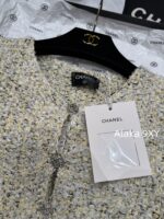 chanel   2024k Early Autumn New Collection  Women's crochet lemon yellow sand thread rhinestone buckle hollow long sleeved knitted cardigan jacket. Mini Short - Image 19