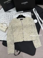 chanel   2024k Early Autumn New Collection  Women's crochet lemon yellow sand thread rhinestone buckle hollow long sleeved knitted cardigan jacket. Mini Short - Image 22