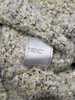 chanel   2024k Early Autumn New Collection  Women's crochet lemon yellow sand thread rhinestone buckle hollow long sleeved knitted cardigan jacket. Mini Short - Image 23