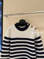 BALMAIN "Pure Desire Goddess Atmosphere" B  24 Autumn/Winter New Collection Round Neck Black and White Striped Diagonal Shoulder Metal Buckle Medium Long Striped Woolen Dress for Women - Image 13