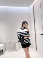 BALMAIN "Pure Desire Goddess Atmosphere" B  24 Autumn/Winter New Collection Round Neck Black and White Striped Diagonal Shoulder Metal Buckle Medium Long Striped Woolen Dress for Women - Image 14