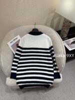 BALMAIN "Pure Desire Goddess Atmosphere" B  24 Autumn/Winter New Collection Round Neck Black and White Striped Diagonal Shoulder Metal Buckle Medium Long Striped Woolen Dress for Women - Image 21
