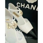 Chanel's own collection  the most beautiful pair of pointed single shoes in 23k. Three dimensional resin camellias embellish the small slope and design, showcasing the leg lengthening artifact - Image 15
