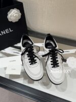 CHANEL High Edition  25C New SeriesHeavy Industry Comic Embroidery Logo Classic Black and White Color blocked Panda Board Shoes/Sports Shoes for Women - Image 9