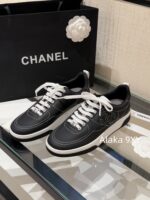 CHANEL High Edition  25C New SeriesHeavy Industry Comic Embroidery Logo Classic Black and White Color blocked Panda Board Shoes/Sports Shoes for Women - Image 28